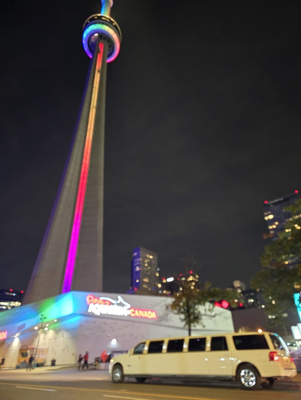 Stretch limousine parked by the CN Tower during a Toronto night out